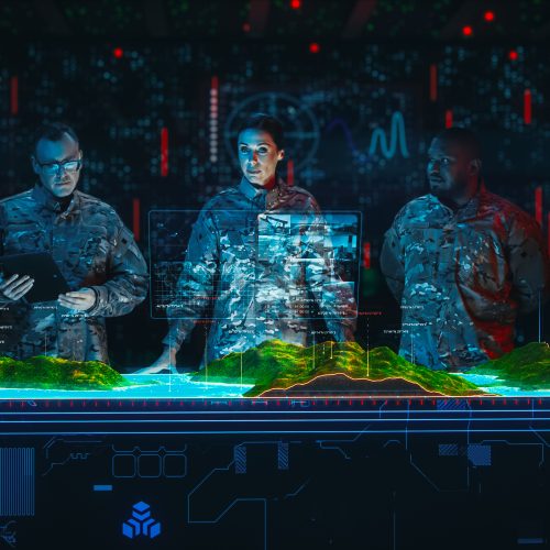 Futuristic Warfare: Military Intelligence Specialists Use Augmented Reality Holographic Table Map to Scan Enemy Terrain. Army Recoinessance Using Sattelite Surveillance Analysis Technology.